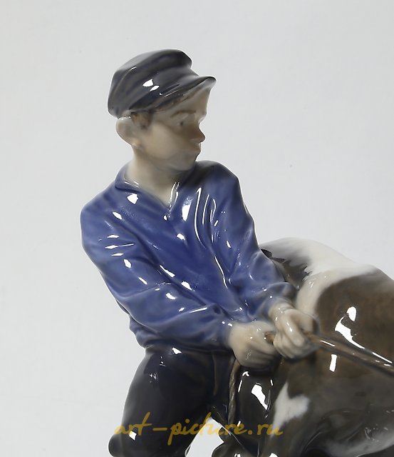 The boy with the calf. Denmark, Copenhagen, Royal Copenhagen.