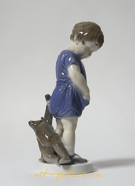 Boy with a teddy bear. Denmark, Copenhagen, Royal Copenhagen.