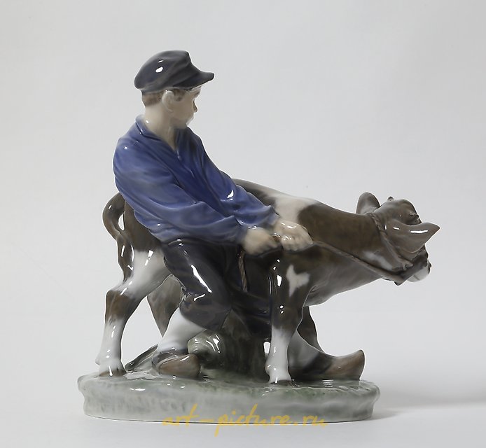 The boy with the calf. Denmark, Copenhagen, Royal Copenhagen.