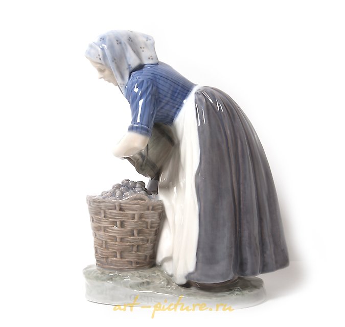 Girl collecting potatoes. Denmark, Copenhagen, Royal Copenhagen.