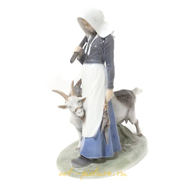 The translation of "Девушка с козами Royal Copenhagen" into English is "Girl with Goats Royal Copenhagen."
