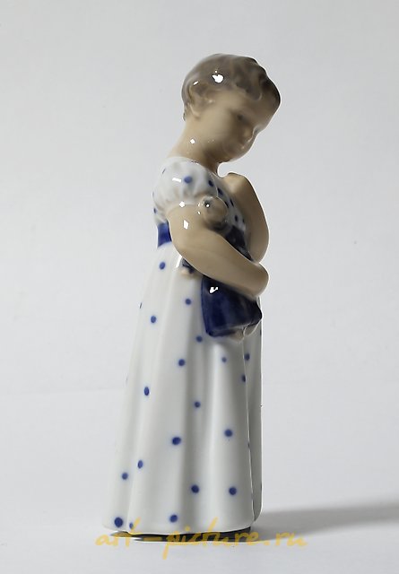 The girl with a doll. Denmark, Copenhagen, Royal Copenhagen.