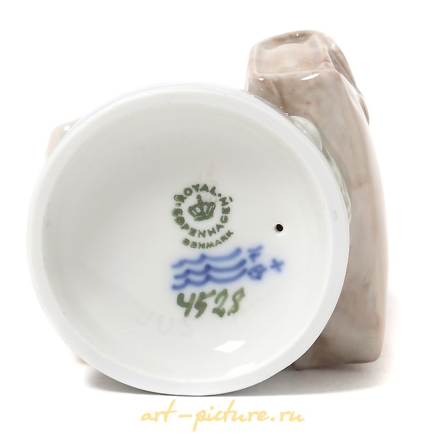 June - a boy with a briefcase. Denmark, Copenhagen, Royal Copenhagen.