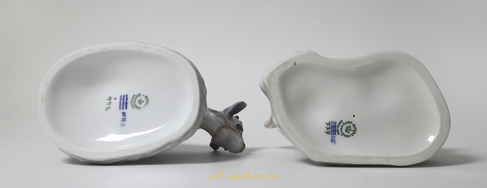 女孩和男孩与小牛。丹麦，哥本哈根，皇家哥本哈根。