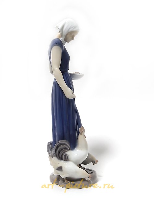 "Girl feeding birds. Denmark, Copenhagen, Bing & Grondahl."