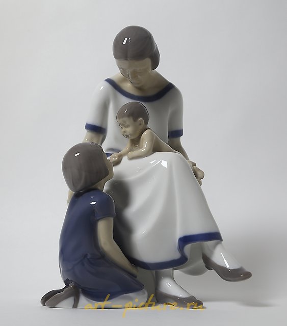 "Mother with two children. Denmark, Copenhagen, Bing & Grondahl."