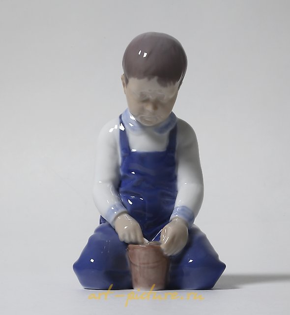 "Boy with a bucket. Denmark, Copenhagen, Bing & Grondahl."