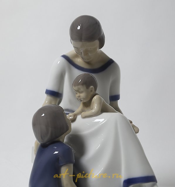 "Mother with two children. Denmark, Copenhagen, Bing & Grondahl."