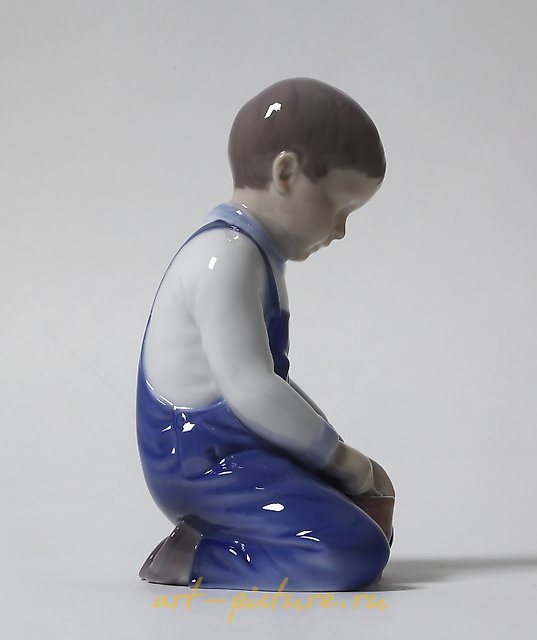 "Boy with a bucket. Denmark, Copenhagen, Bing & Grondahl."