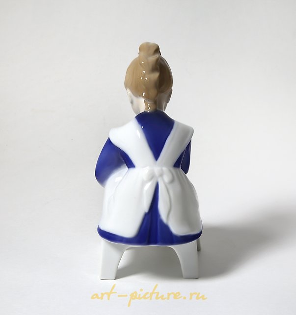 Porcelain figurine (statuette) Marianna. A girl is tying shoelaces Bing Grondahl.