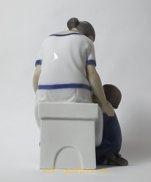 "Mother with two children. Denmark, Copenhagen, Bing & Grondahl."