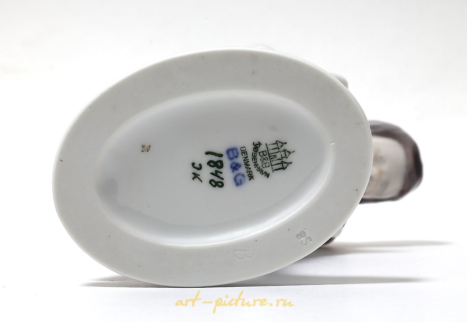 The translation of the text is: "Rider. Denmark, Copenhagen, Bing & Grondahl."