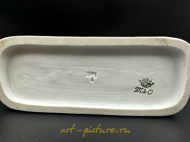 The translation of the text is: "figurine Dachshund Metzler & Ortloff Germany."