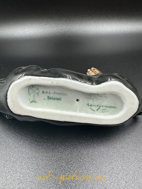 The figurine of a Dachshund lying on its back, Factory Karl Ens Porzellanfabrik Karl Ens.