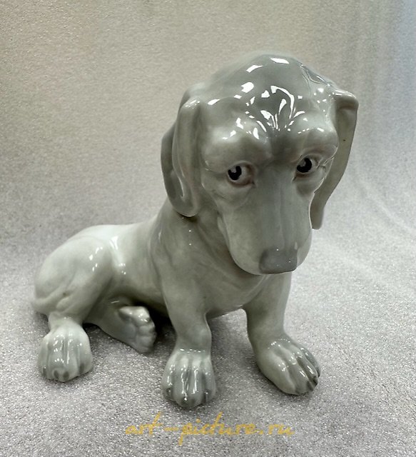 The translation of the text is "Sad dog, HEUBACH, GERMANY."