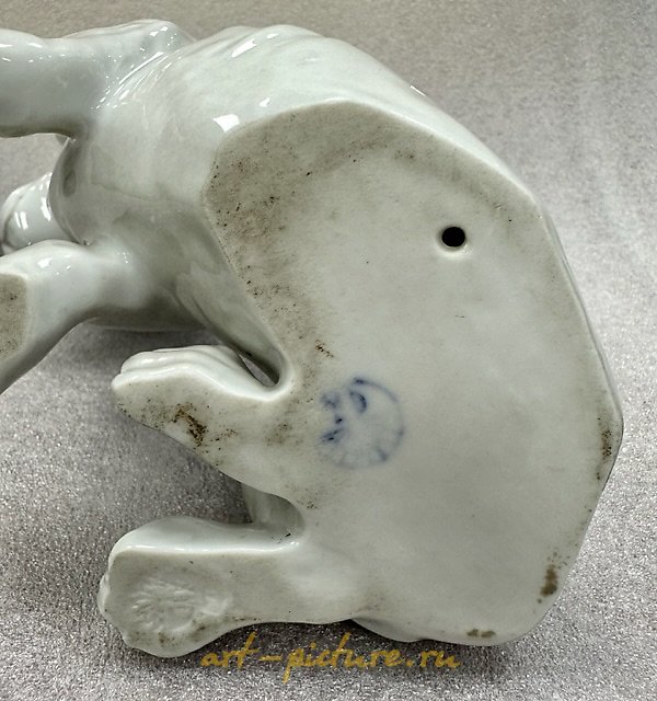 The translation of the text is "Sad dog, HEUBACH, GERMANY."