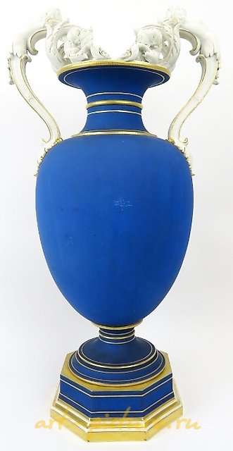 VASE ON AN OCTAGONAL BASE WITH BISCUIT HANDLES. KPM BERLIN. 1875.