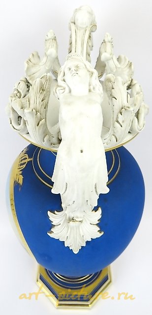 VASE ON AN OCTAGONAL BASE WITH BISCUIT HANDLES. KPM BERLIN. 1875.