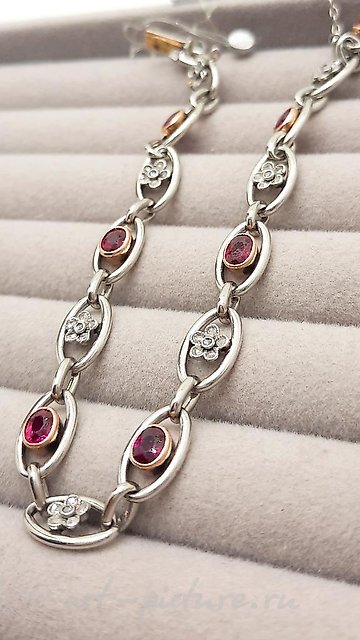 Here is the translation of your text into Simplified Chinese:

铂金黄金镶钻石红宝石手链 50年代