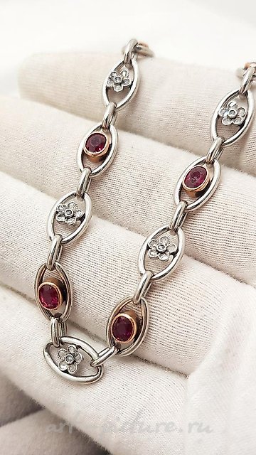 Here is the translation of your text into Simplified Chinese:

铂金黄金镶钻石红宝石手链 50年代