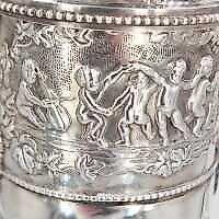 The translation of "Серебряный кувшин" into English is "Silver pitcher."