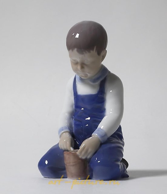 "Boy with a bucket. Denmark, Copenhagen, Bing & Grondahl."