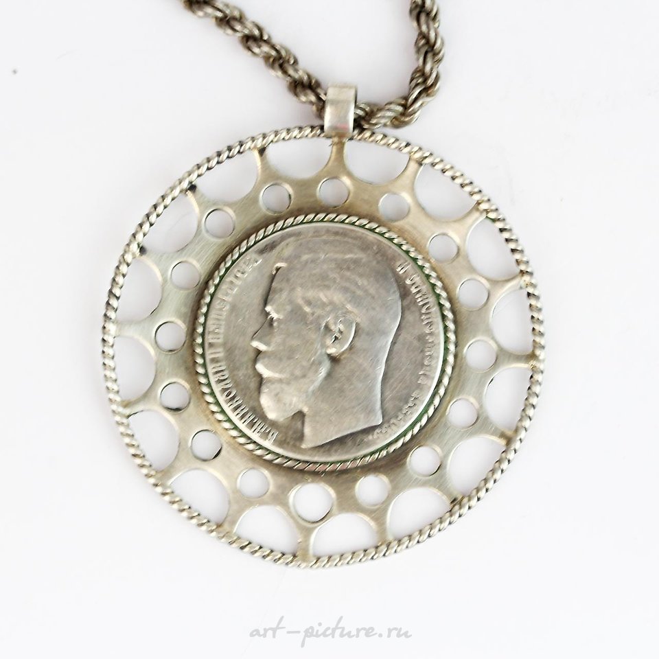 Russian silver , A 9ct yellow gold key pendant on a 9ct gold chain, L. 38cm.