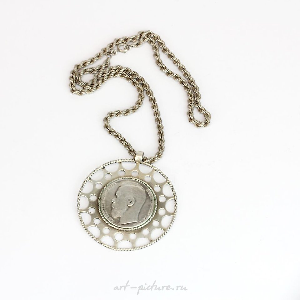 Russian silver , A 9ct yellow gold key pendant on a 9ct gold chain, L. 38cm.