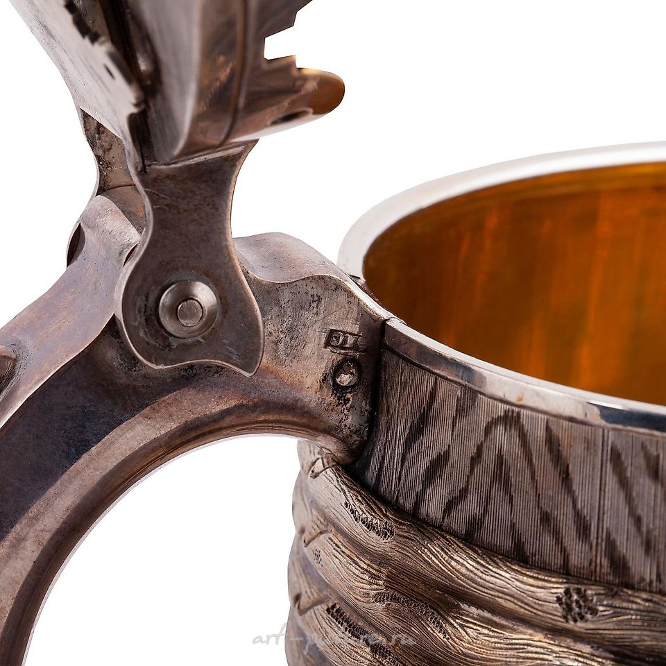 Russian silver , A massive Russian trompe l'oeil silver-gilt mug with cast and...