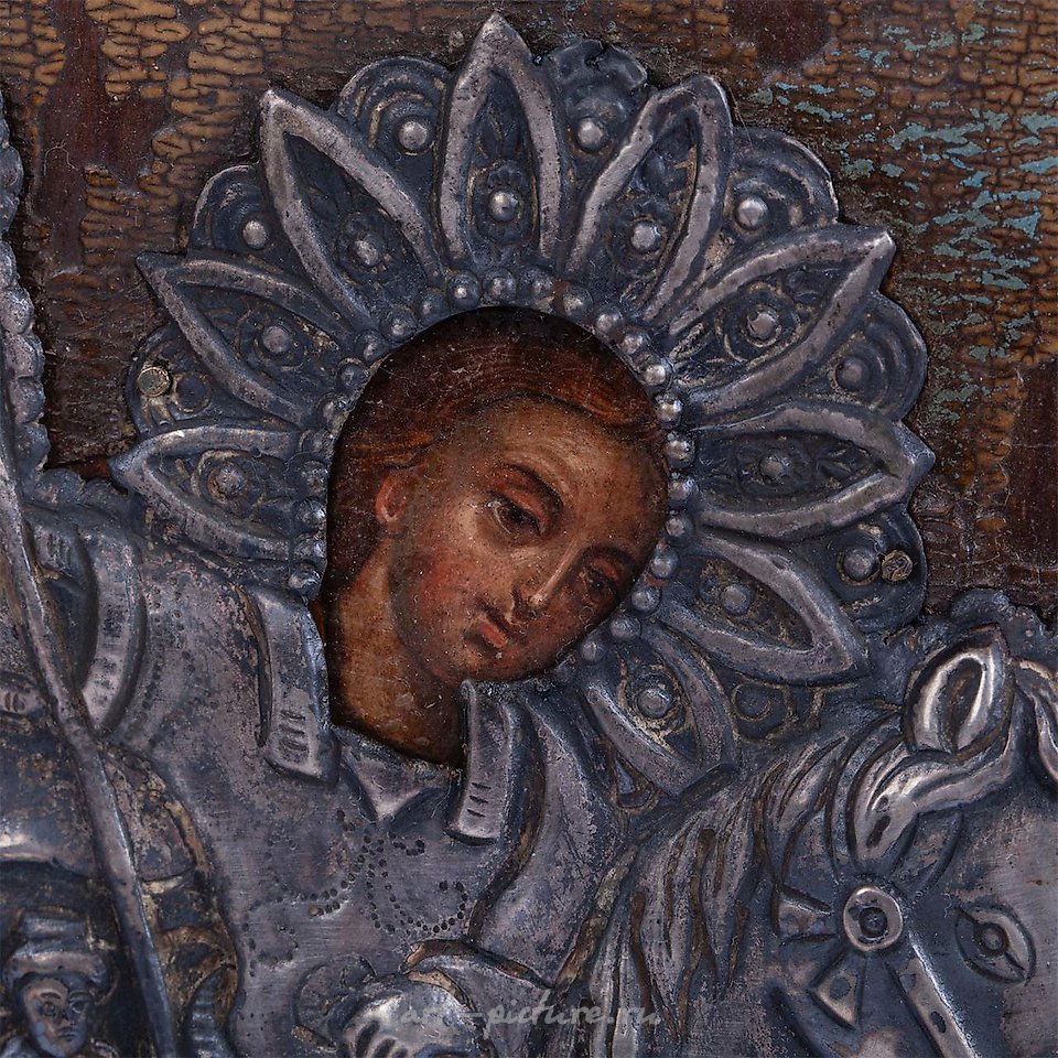 Russian silver , A Russian wood icon in silver riza "St. George and the Dragon..."
