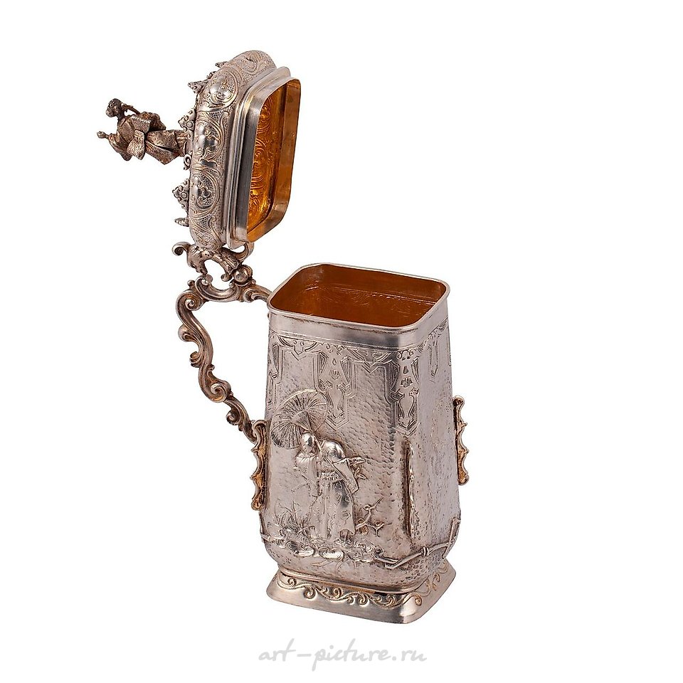 Russian silver , A massive Russian cast silver-gilt tankard in Japanese style...