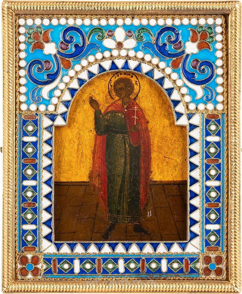 Russian silver , A SMALL ICON SHOWING A MONK WITH A SILVER-GILT...