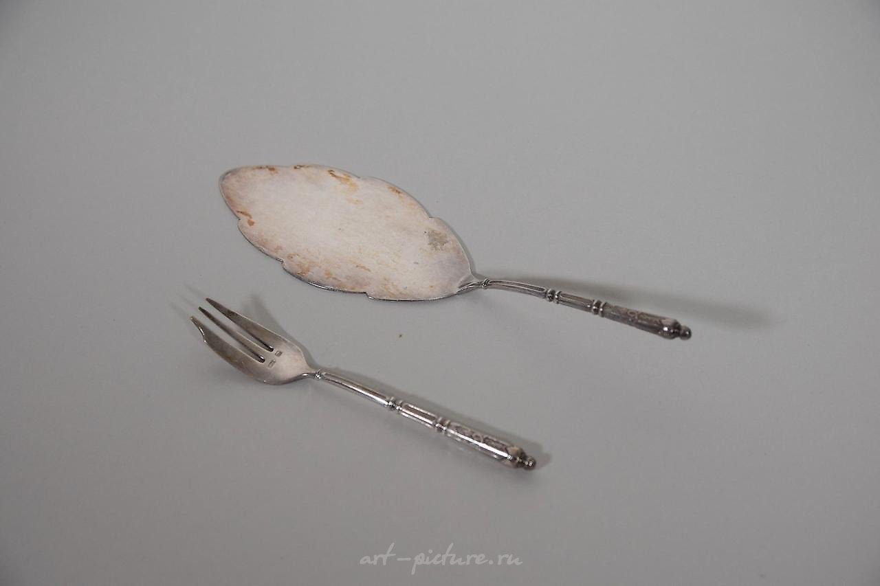 Russian silver , Part of a silver-plated menagerie with net and...