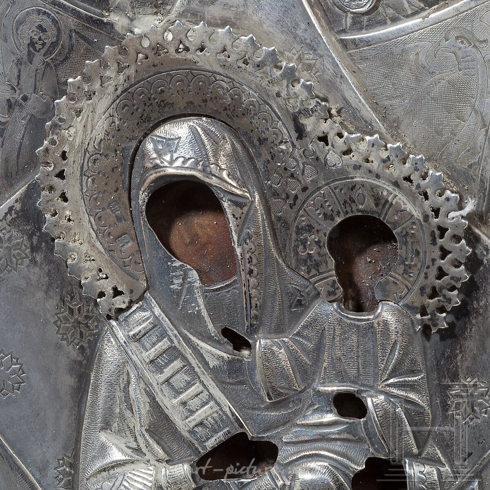 Russian silver , Silver oklad and two small icons of the Mother of God are...