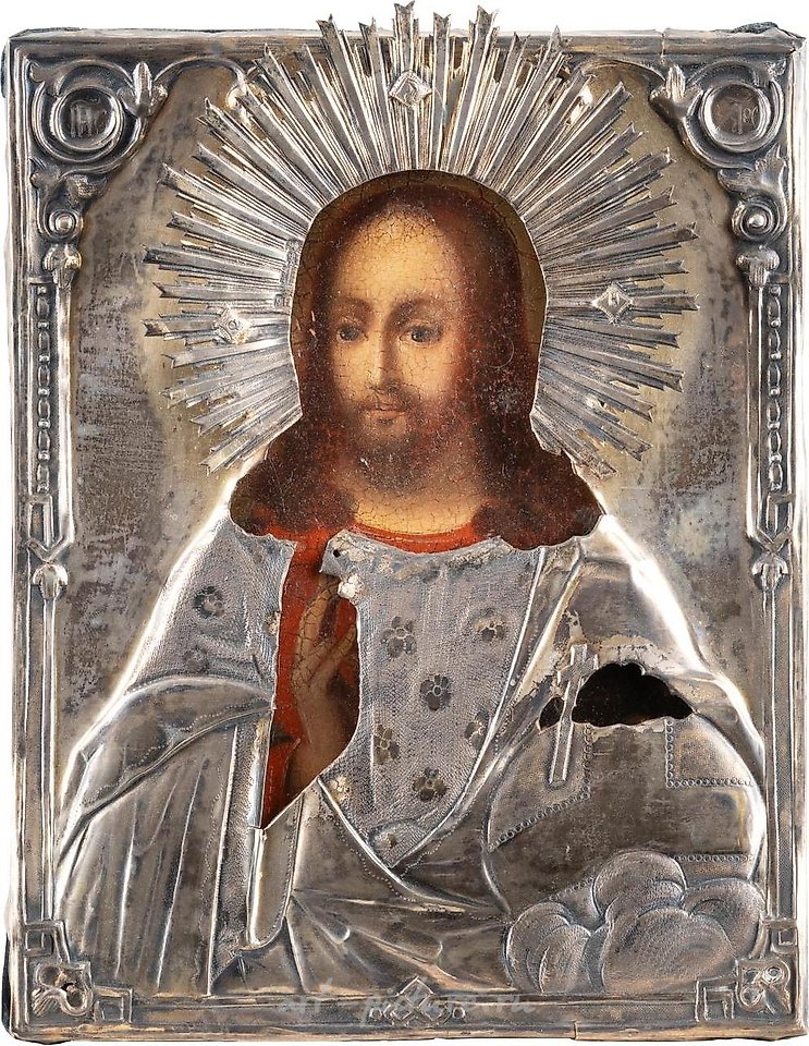 Russian silver , A SMALL ICON SHOWING CHRIST THE SAVIOUR WITH A SILVER-GILT O...