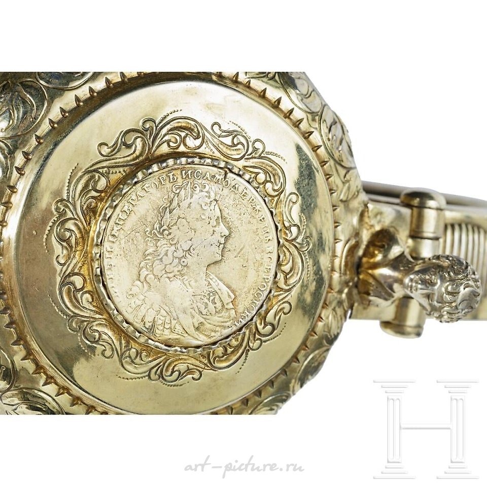 Russian silver , A large Russian silver-gilt lid tankard with a coin of Peter I...