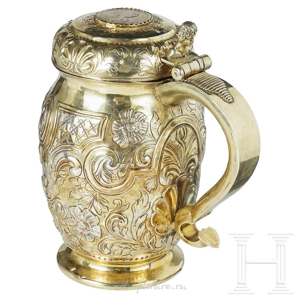 Russian silver , A large Russian silver-gilt lid tankard with a coin of Peter I...