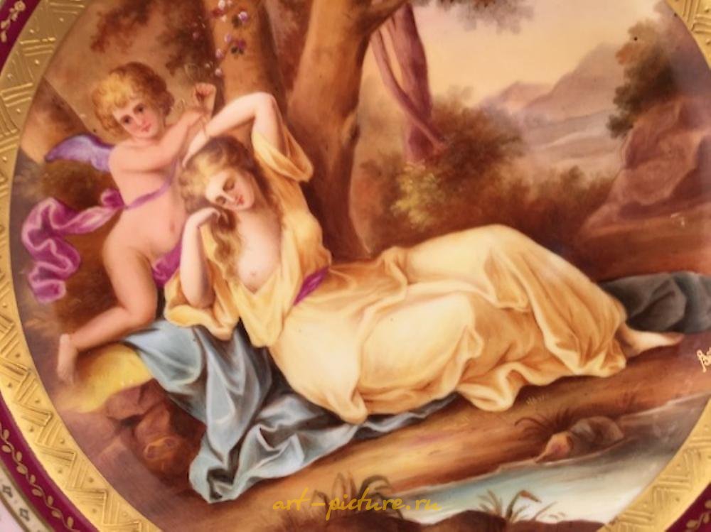 Royal Vienna Porcelain , Royal Vienna portrait plate with a reclining woman and a win...