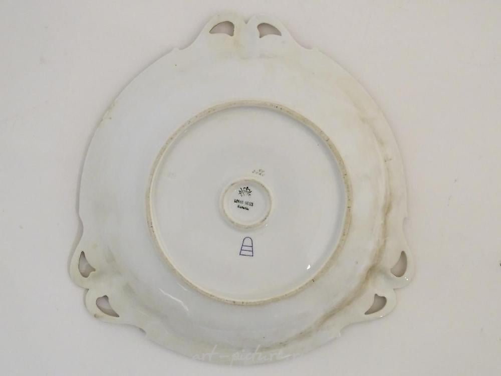 Royal Vienna Porcelain , A Continental three handled cabinet plate, the cen...