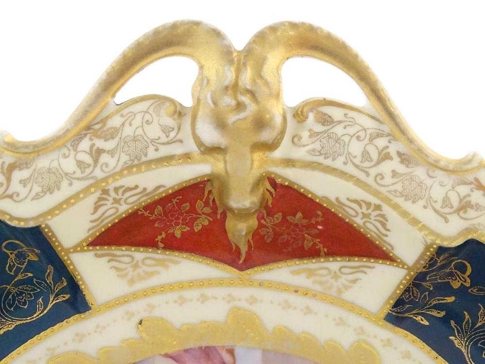 Royal Vienna Porcelain , A Continental three handled cabinet plate, the cen...