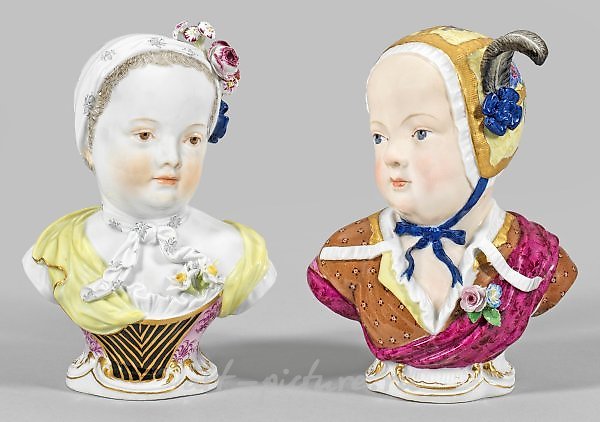 A pair of children's busts as counterparts.