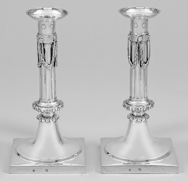 A pair of classical table candelabras