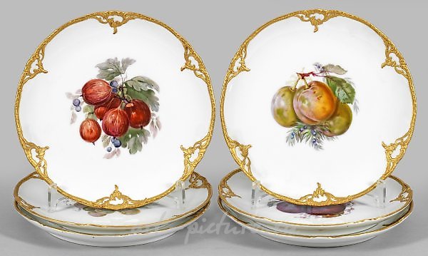 Six cake plates with fruit decoration.