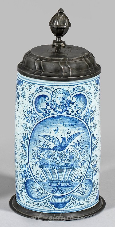 The term "Walzenkrug" in German refers to a specific type of ceramic vessel commonly used in traditional German drinking establishments. This exquisite piece of craftsmanship is characterized by its cylindrical shape and distinctive ribbed design. Th