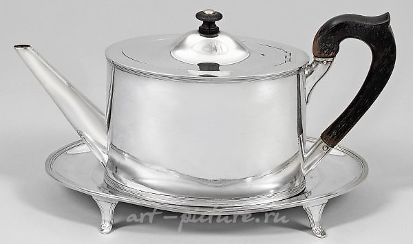 Elegant Empire teapot on a display stand.