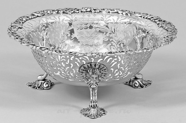 George III - Durchbruchschale

The Durchbruchschale, or pierced bowl, of George III is a remarkable piece of artistry that exemplifies the exquisite craftsmanship of the Georgian era. This stunning creation showcases the mastery of the silversmith, w