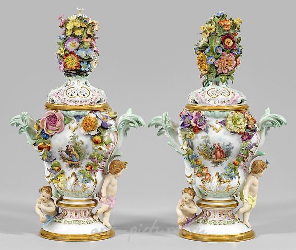 A couple of potpourri vases with cupids and Watteau scenes.