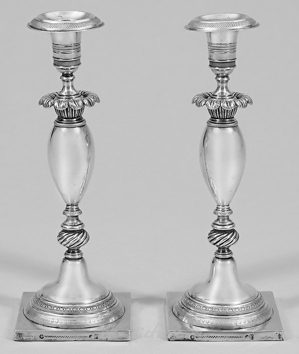 A couple of Biedermeier table candlesticks.