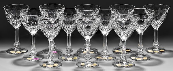 Sentence: Satz von zwölf Moser-Sherriegläsern - "Lady Hamilton Gold"

Translation: Set of twelve Moser Sherry glasses - "Lady Hamilton Gold"

In this sentence, we have a description of a set of twelve Moser Sherry glasses, specifically the "Lady Hami