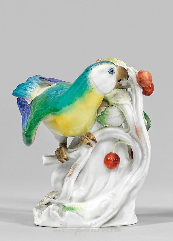 Papagei auf Kirschbaum translates to "Parrot on Cherry Tree" in English.